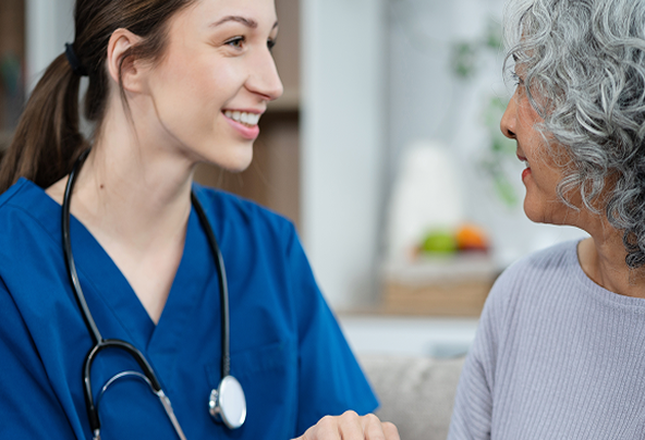 A doctor smiling at someone